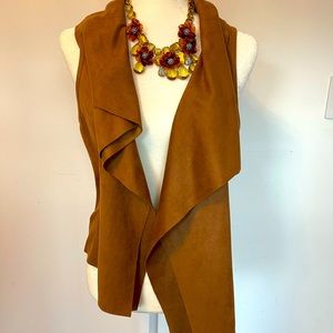 Karen Kane Shearling Vest Woman with beautiful neck piece